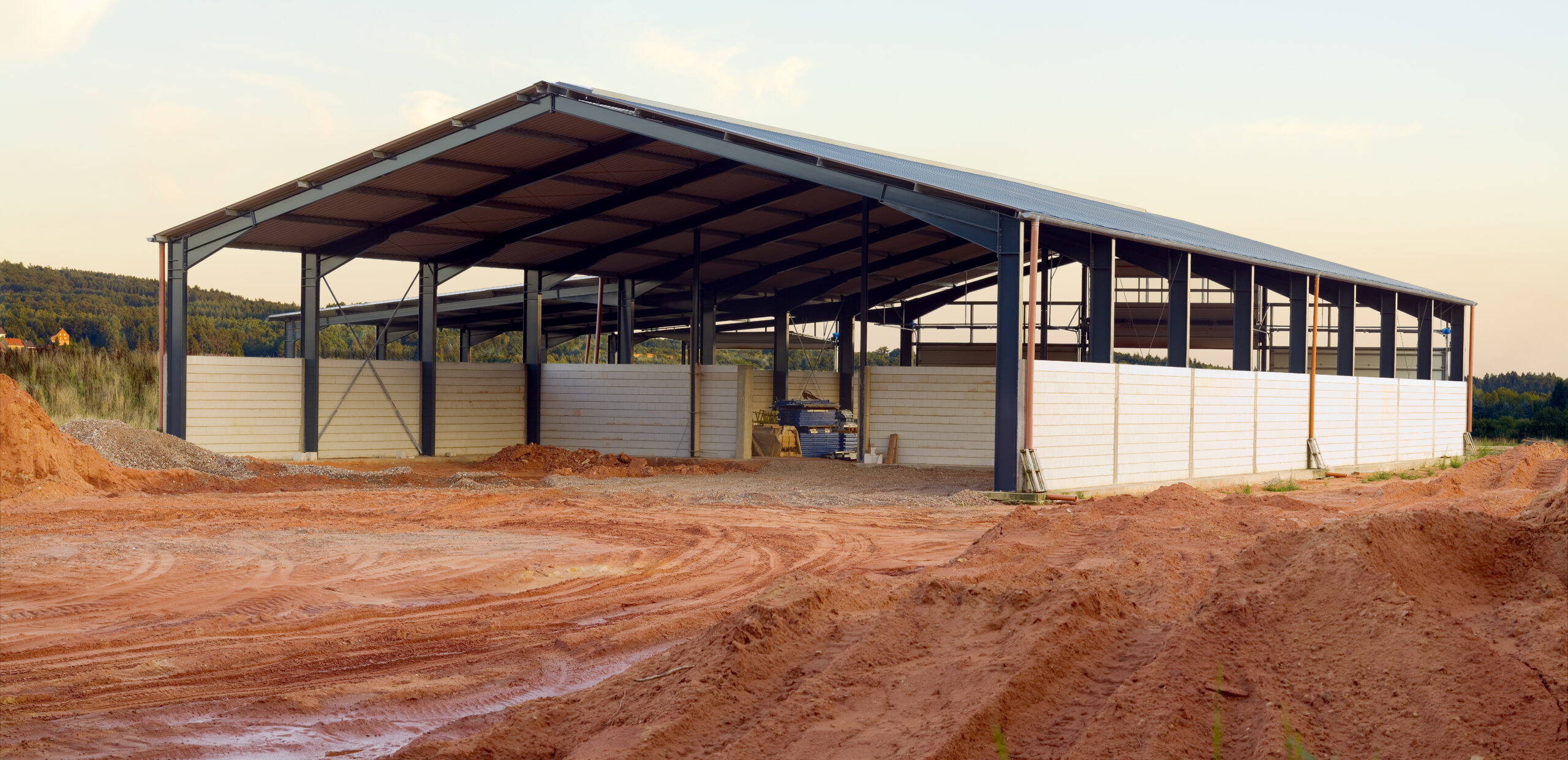 a building under construction with dirt