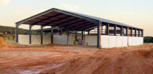 a building under construction with dirt